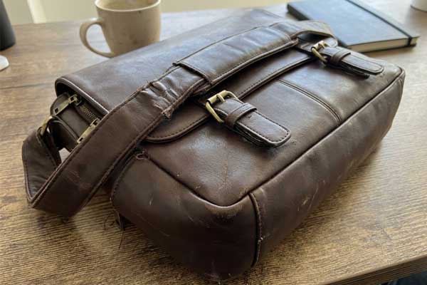 vegan leather durability in real-world daily use daily commuter bag showing wear patterns after 12 months of use