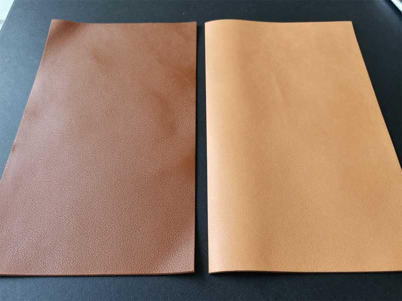 Close-up texture of premium microfiber leather used in bag manufacturing high grade microfiber leather close up texture showing fiber structure